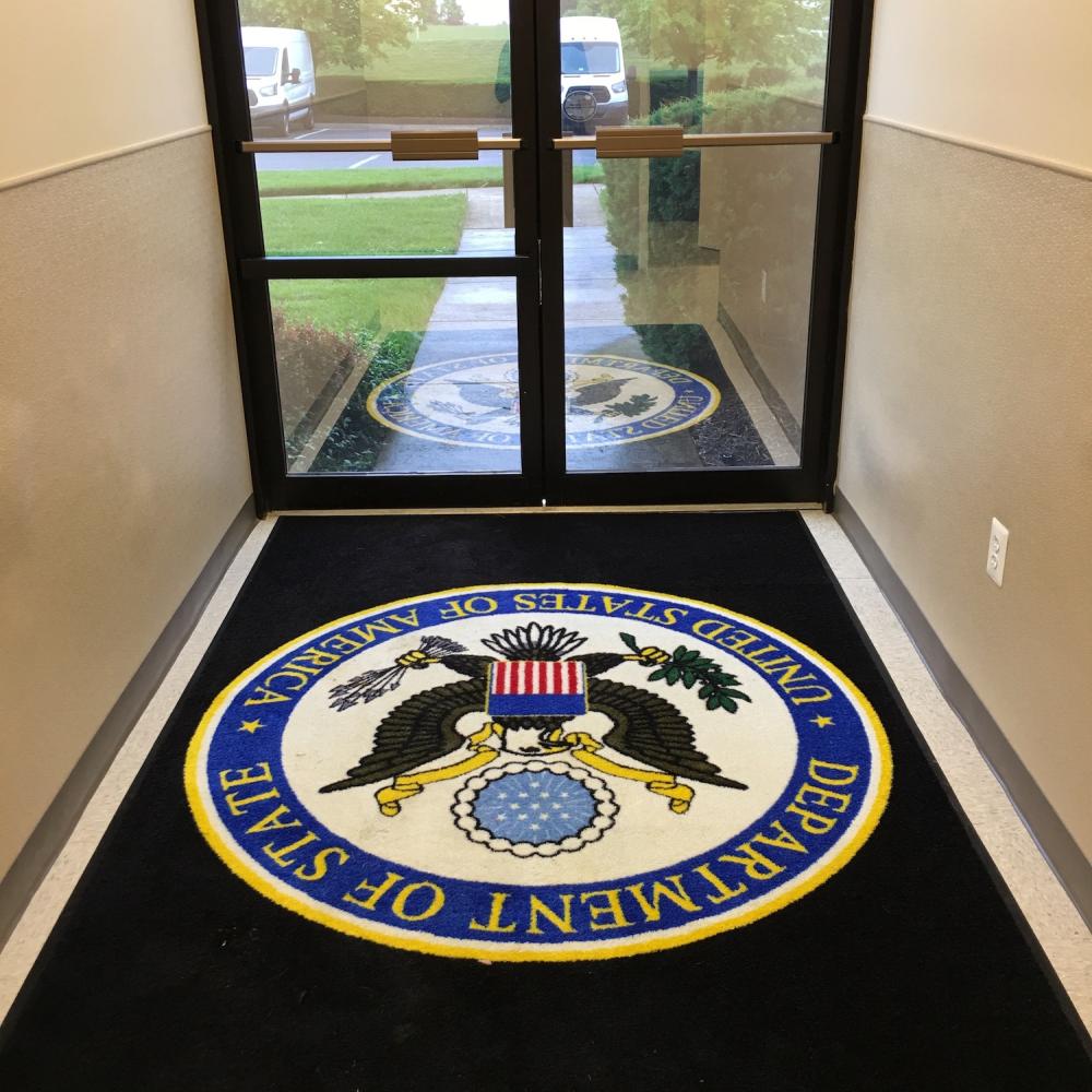 Entrance with a carpet.